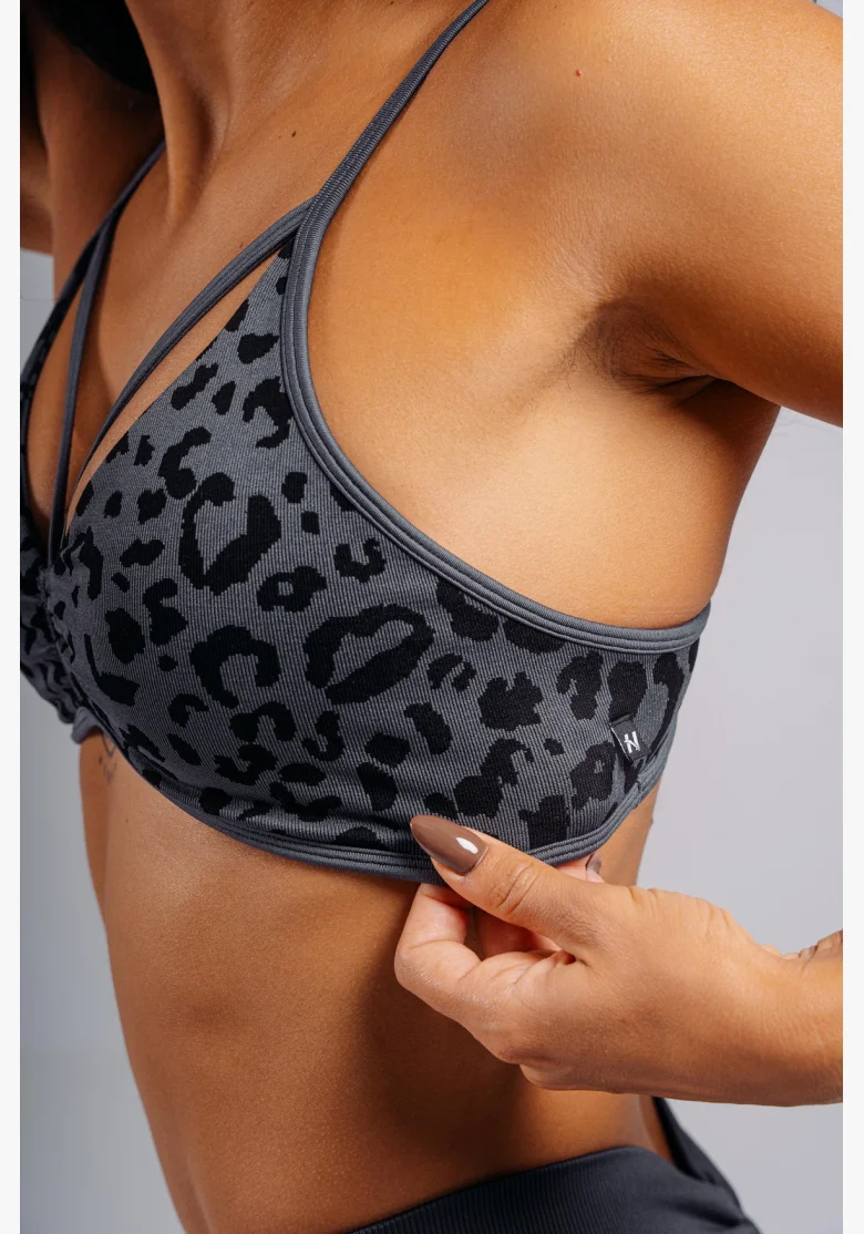 NEBBIA Medium support sportovní podprsenka s leopardím vzorem PRIMAL černá