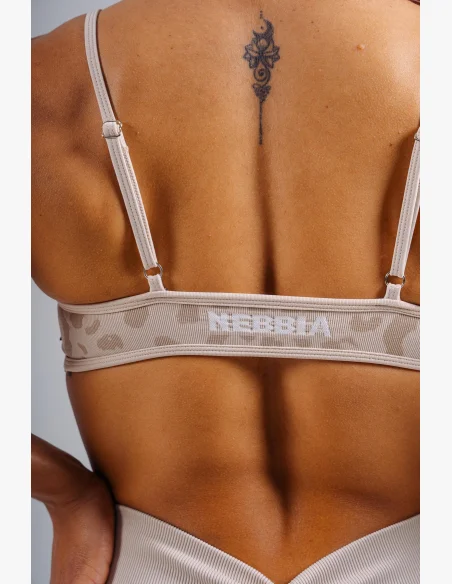 NEBBIA Medium support sportovní podprsenka s leopardím vzorem PRIMAL krémová