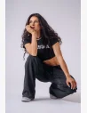 Dámské Olympia tepláky s volnějším střihem, washed efektem a old-school bodybuilding designem pro výrazný gym look při tréninku i mimo něj