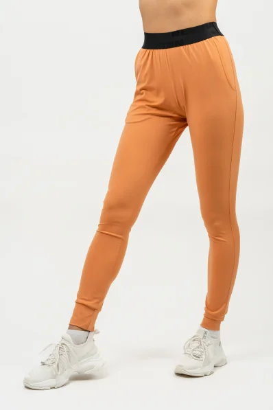 NEBBIA • Slim fit legíny s kapsami GYM SPIRIT oranžová • Nebshop.cz