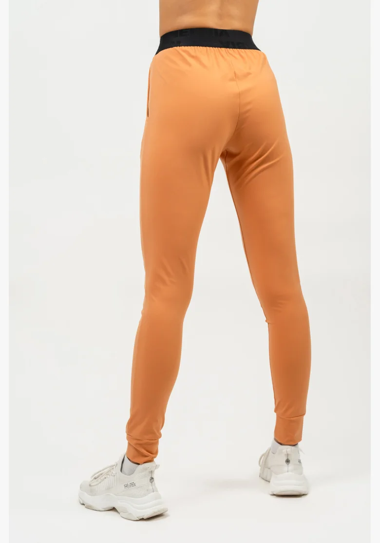 NEBBIA • Slim fit legíny s kapsami GYM SPIRIT oranžová • Nebshop.cz