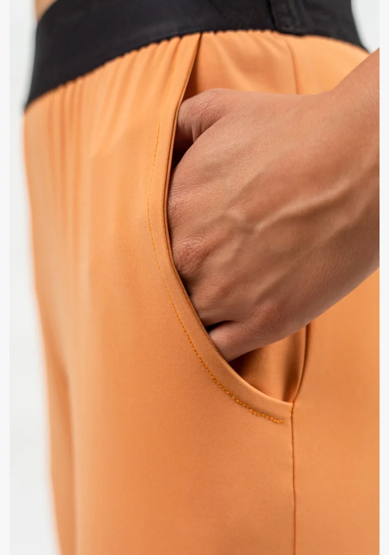 NEBBIA • Slim fit legíny s kapsami GYM SPIRIT oranžová • Nebshop.cz