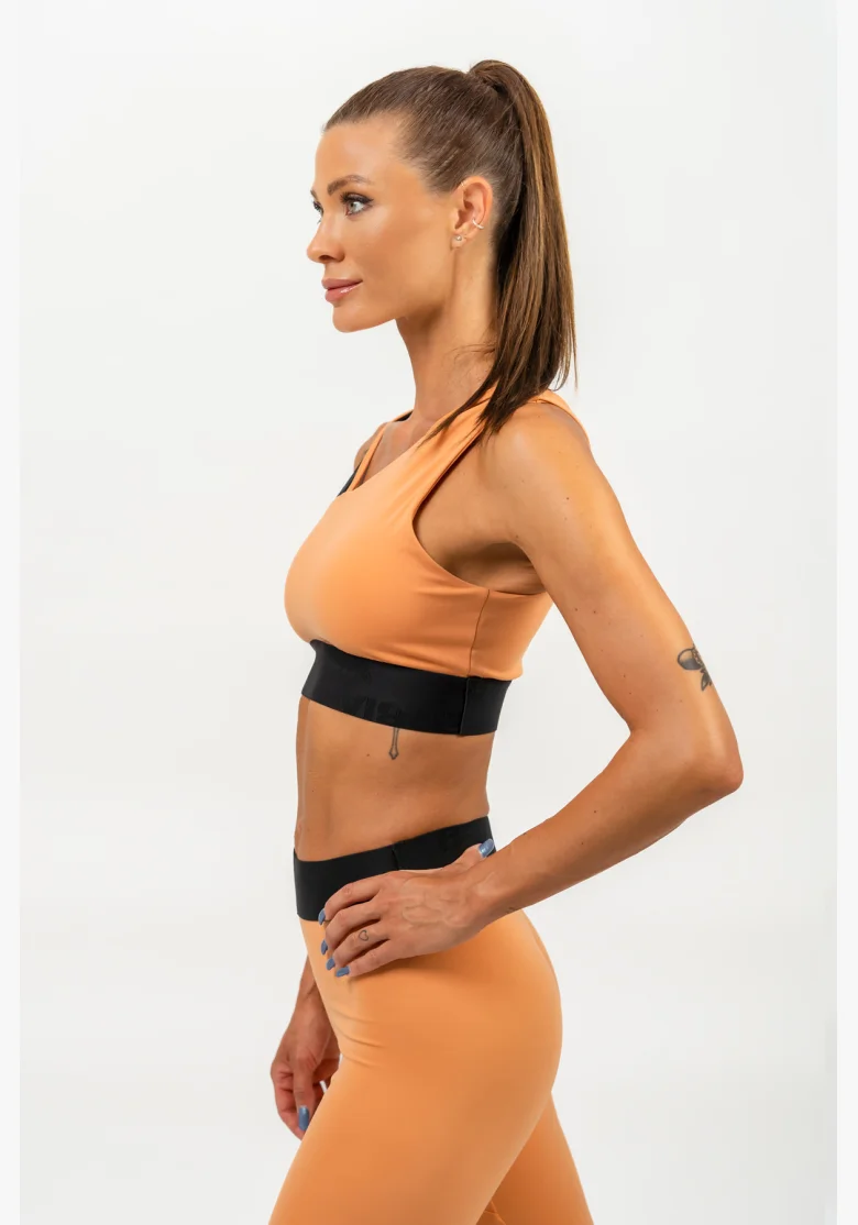 NEBBIA • Asymetrická sportovní podprsenka ELITE oranžová • Nebshop.cz