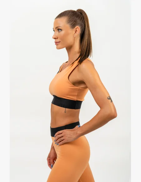 NEBBIA • Asymetrická sportovní podprsenka ELITE oranžová • Nebshop.cz