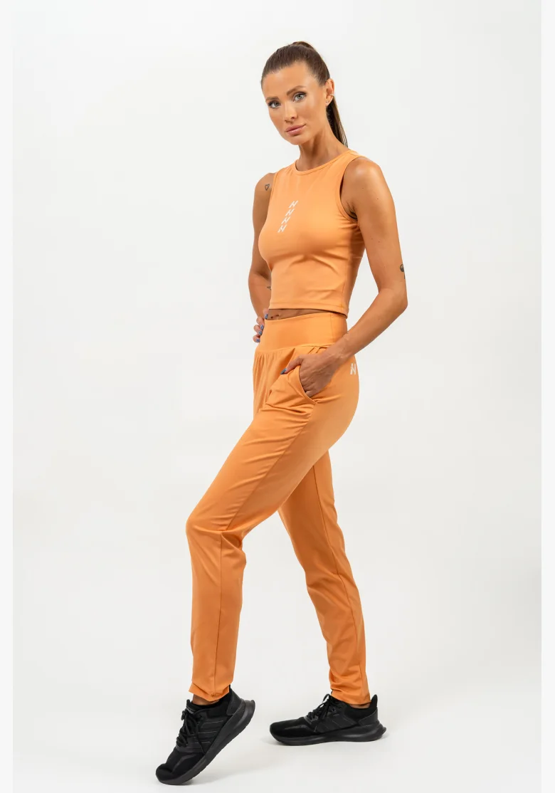 NEBBIA • Slim fit legíny s kapsami SLEEK oranžová • Nebshop.cz