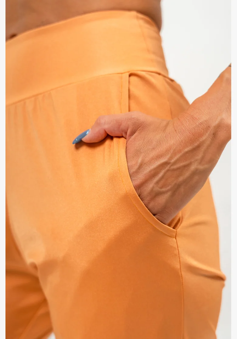 NEBBIA • Slim fit legíny s kapsami SLEEK oranžová • Nebshop.cz