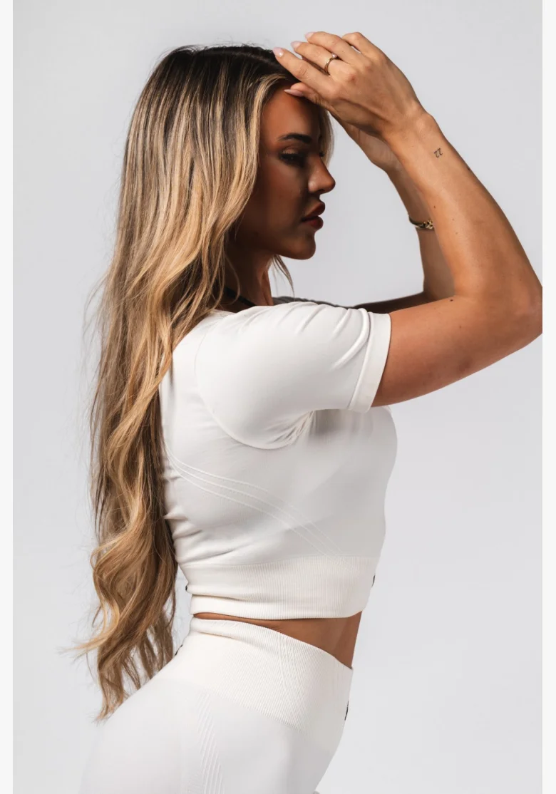 NEBBIA Tvarující bezešvý crop top FLOW SEAMLESS krémový